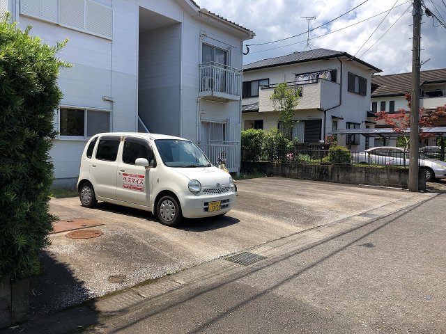 【姶良市西餅田のアパートの駐車場】