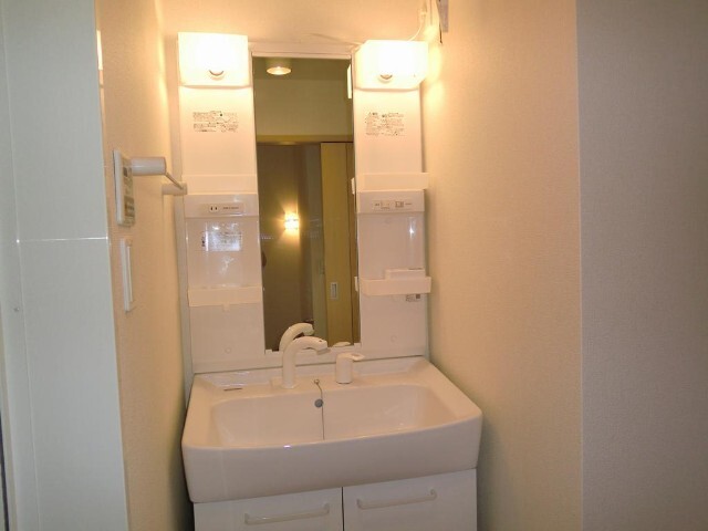 洗面設備　※反転２０２号室の写真