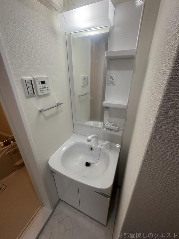 洗面設備　（写真は同タイプ）