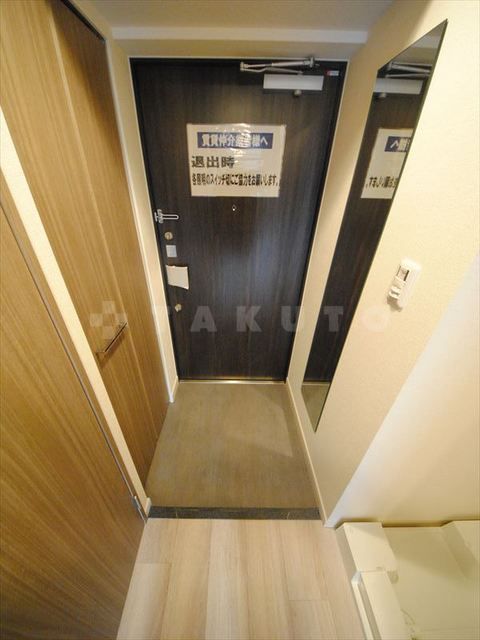 プレサンス堺筋本町ディスティニーの玄関写真