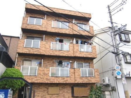 大阪市平野区加美正覚寺のマンションの建物外観