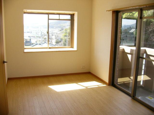 居室・リビング　写真は別号室のものです。