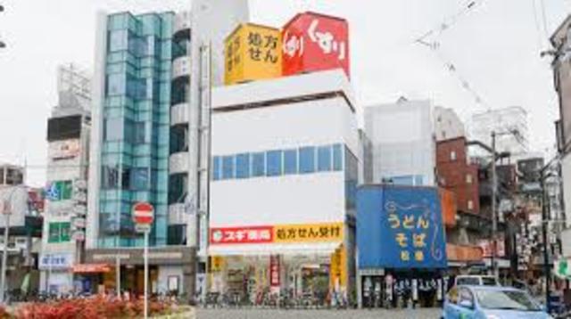 ドラックストア　スギ薬局塚本駅前店（ドラッグストア）まで165m
