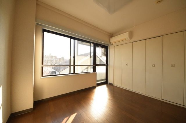 朝日チェリーヒルズ上野町の居間写真
