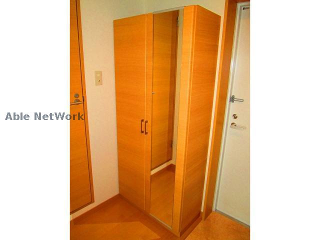 玄関　同物件302号の写真