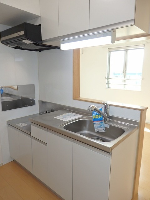 キッチン　写真は別号室のものです。