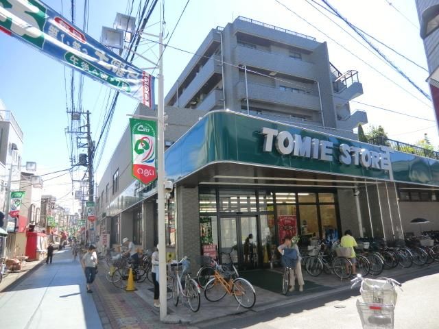 スーパー　トミエストア（スーパー）まで210m
