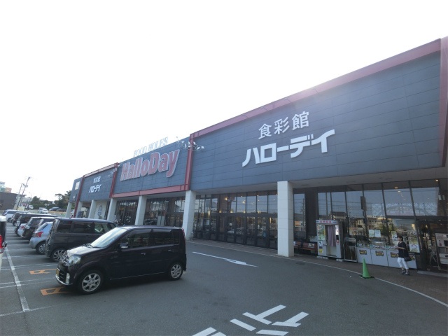 ショッピングセンター　Seriaハローデイ綾羅木店（ショッピングセンター）まで990m