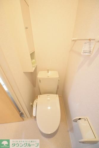 トイレ　洗浄機能付　収納棚あり