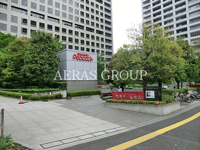 スーパー　ピーコックグランパーク田町店（スーパー）まで396m