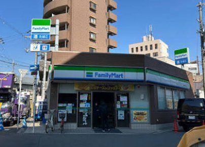 コンビニ　ファミリーマート豊新三丁目店（コンビニ）まで410m