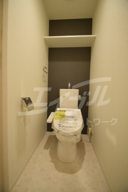阪急千里線 天神橋筋六丁目駅 徒歩7分 10階建 築9年のトイレ写真