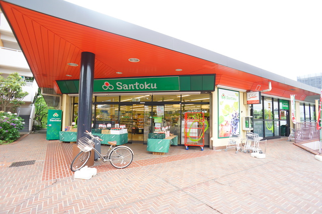 スーパー　スーパーマーケット三徳多摩店（スーパー）まで702m