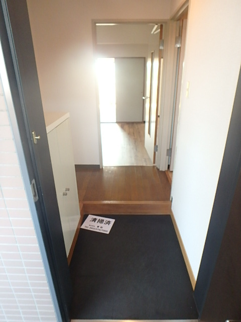 リッジモントゥ鶴牧の玄関写真