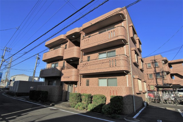 松山市東石井のマンションの建物外観