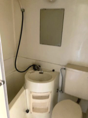 洗面設備　※原状回復工事前のお部屋です