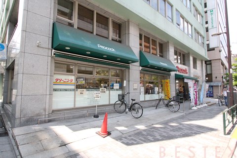 スーパー　ピーコックストア神田妻恋坂店（スーパー）まで386m