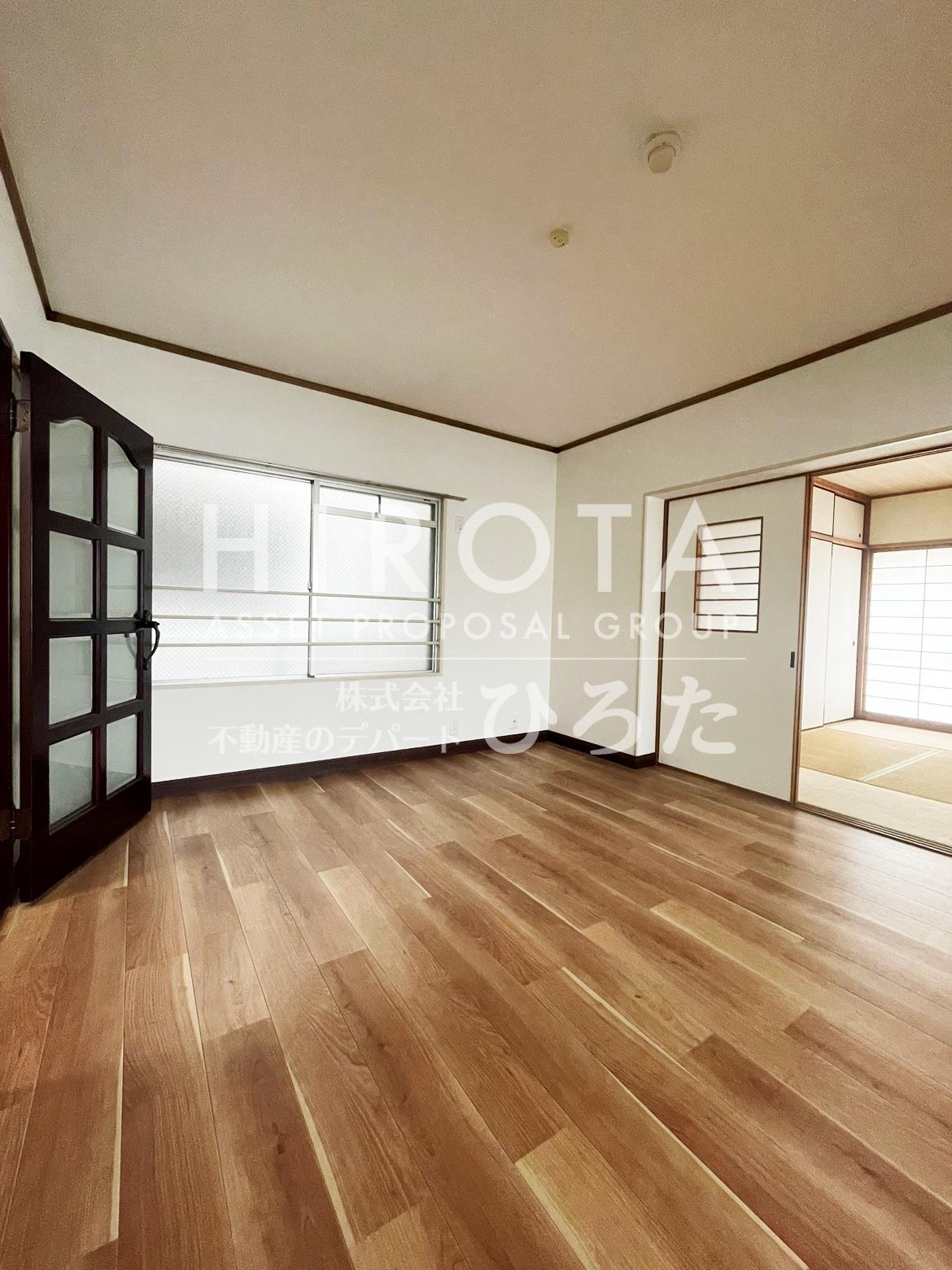 サンシティ三萩野の居間写真