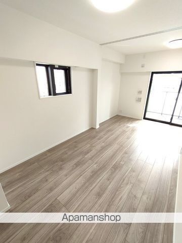 東武伊勢崎線 浅草駅 徒歩14分 10階建 築2年の居間写真