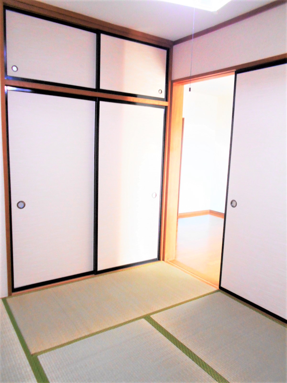ハーモニーハイツ I棟の居間写真