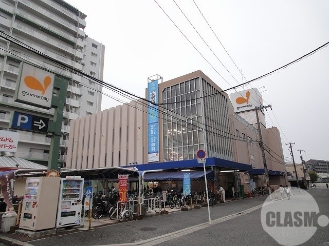 スーパー　ダイエーグルメシティ津久野店（スーパー）まで238m