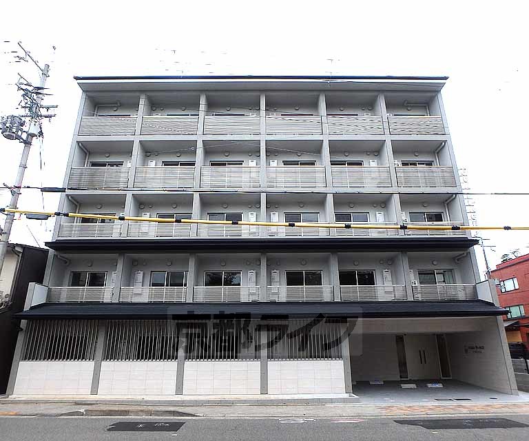 京都市上京区新桝屋町のマンションの建物外観