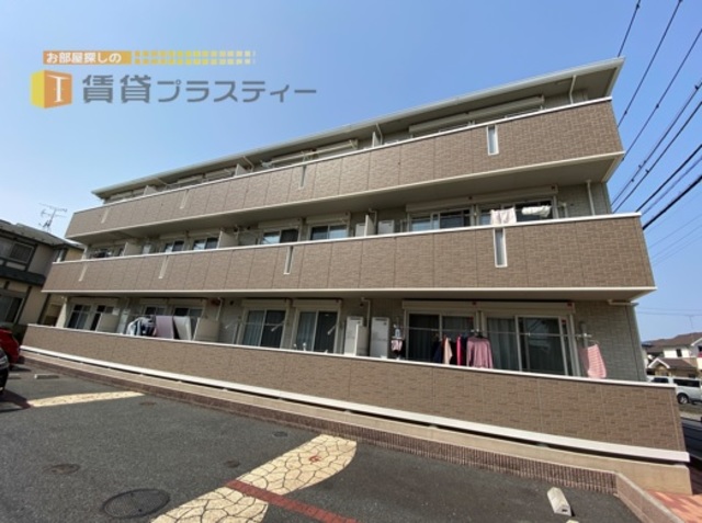 建物外観　角地に堂々建つ。それがゴールドインロータス。