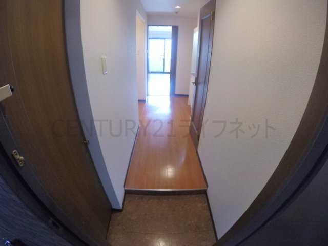 ロイヤルクイーンズパーク江坂の玄関写真