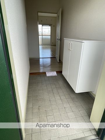 地下鉄鶴舞線 上小田井駅 徒歩8分 4階建 築37年の玄関写真