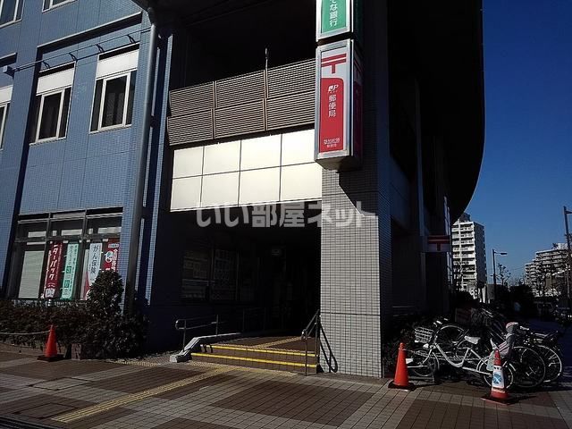 【草加市金明町のアパートの郵便局】