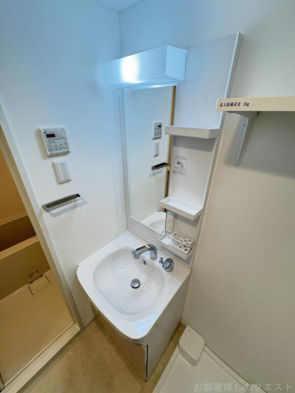 洗面設備　（写真は同タイプ）
