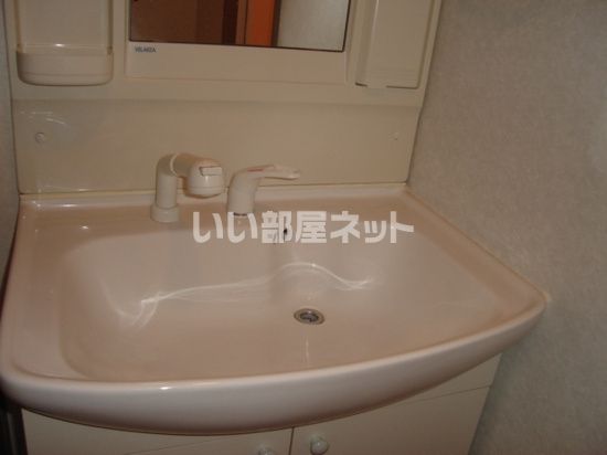 【郡山市日和田町のマンションの洗面設備】