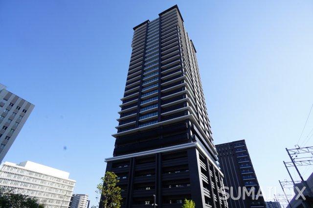 【熊本市西区春日のマンションの建物外観】