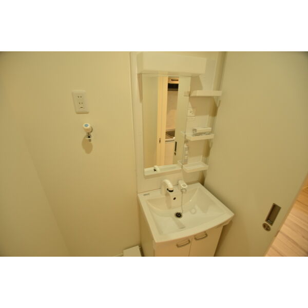 洗面設備　※同シリーズの室内写真となります。