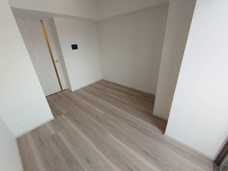 コンフォリアリヴ千住の居間写真