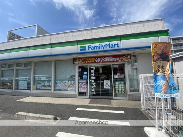コンビニ　ファミリーマートアイダ草加中央店（コンビニ）まで660m