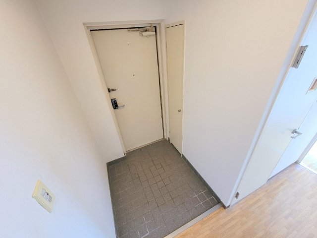 サンコスモ生駒の玄関写真