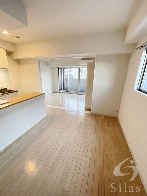 地下鉄御堂筋線 長居駅 徒歩2分 15階建 築15年の居間写真