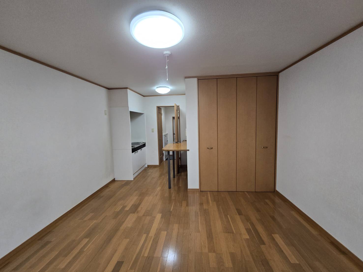 サニーコーポ西牧野の居間写真