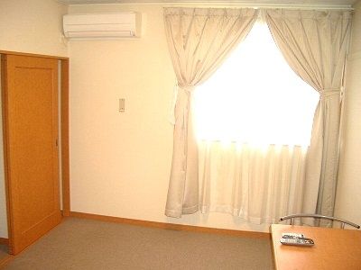 レオパレスウィルほたる野の居間写真