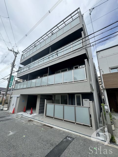 【大阪市住吉区遠里小野のマンションの建物外観】