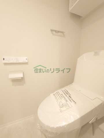 トイレ　※参考写真　1404号室（同じタイプ）の写真となります。