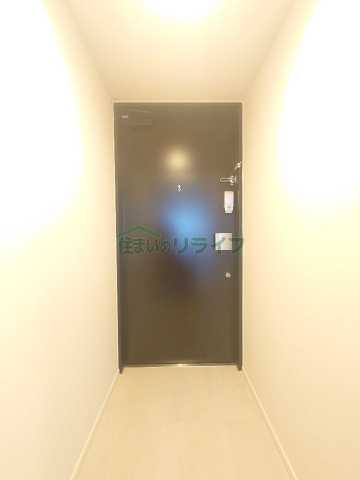 玄関　※参考写真　1404号室（同じタイプ）の写真となります。
