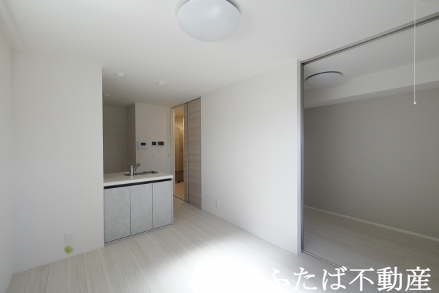 トリシア博多麦野 壱番館の居間写真