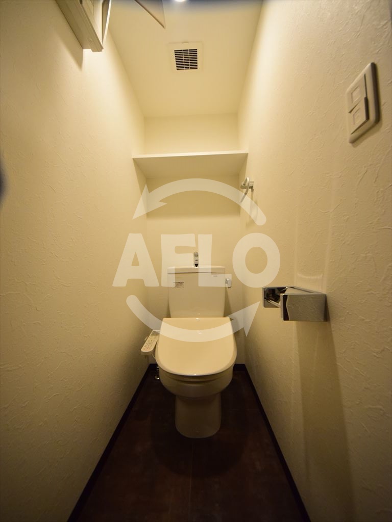 地下鉄御堂筋線 大国町駅 徒歩10分 15階建 築7年のトイレ写真