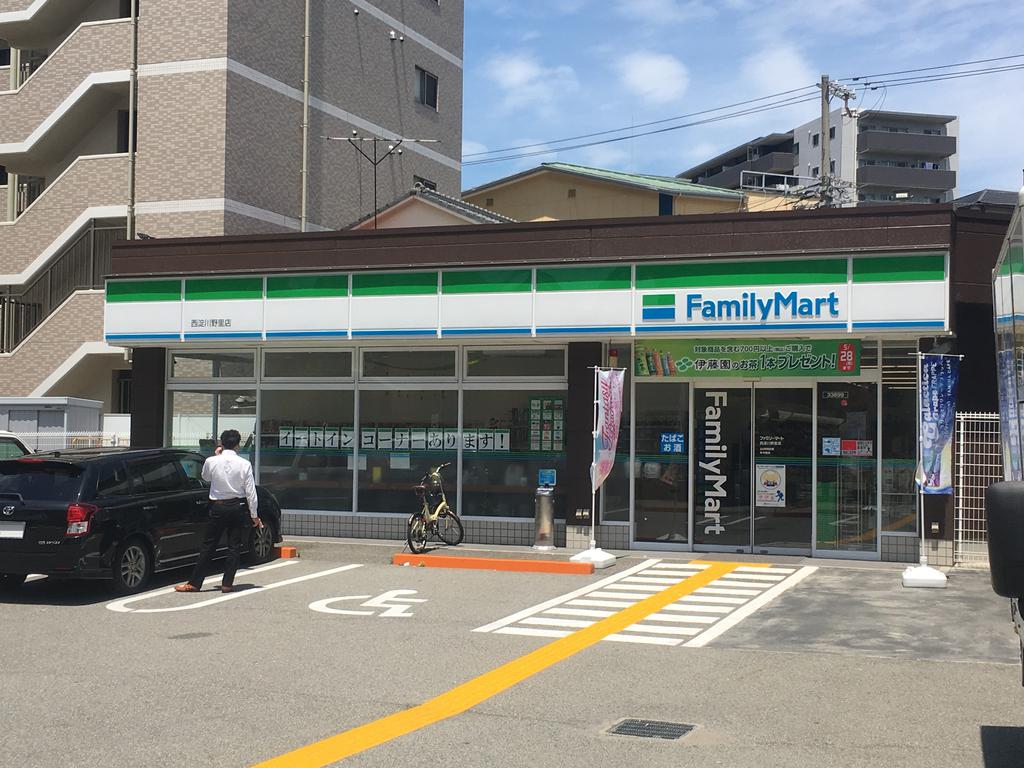 コンビニ　ファミリーマート西淀川野里店（コンビニ）まで435m