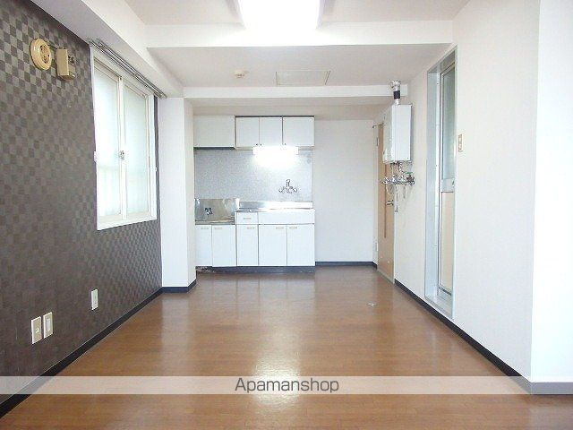 メゾンドボワール円山の居間写真