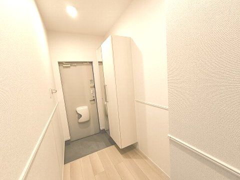 グレースヒルズGAMO A棟の玄関写真