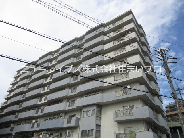 寝屋川市香里南之町のマンションの建物外観