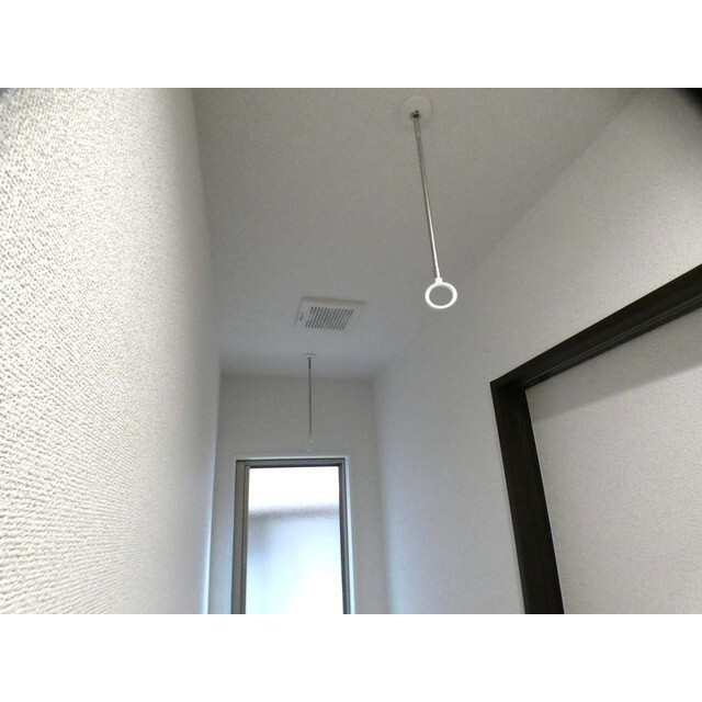 バルコニー　サンルーム　室内物干金具